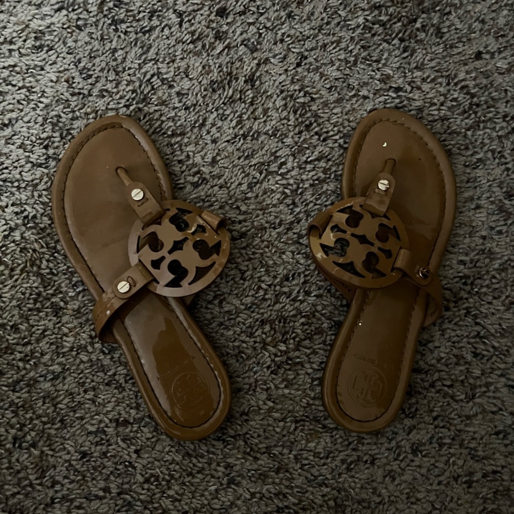 Tan colored tory burches